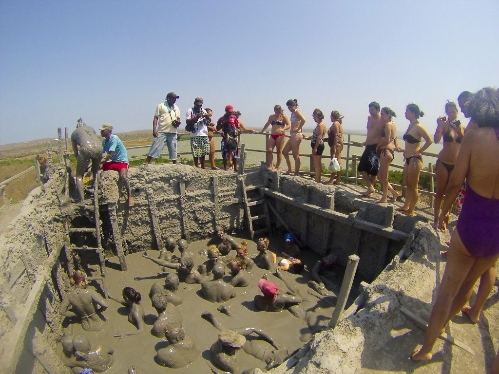 bodies in a mud pit.